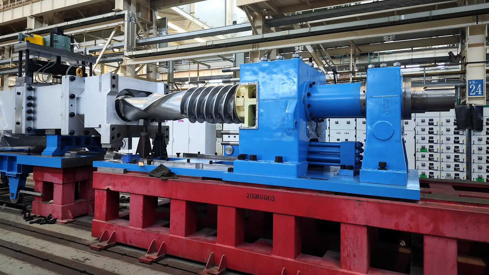Close-up of an extrusion screw and gearbox